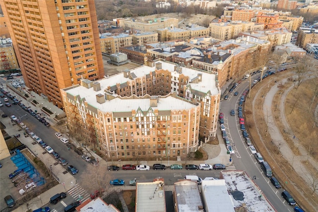 birds eye view of property with a city view