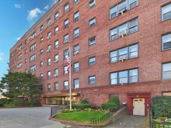 143-50 Hoover Ave Unit 512, Briarwood, NY 11435 - view of apartment building / complex