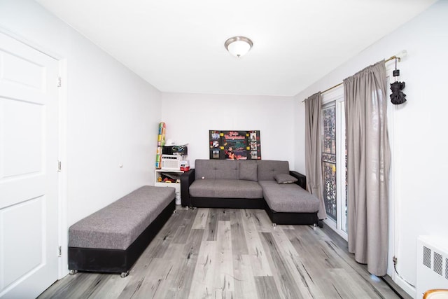 sitting room featuring light wood-type flooring