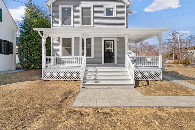 view of front of property featuring covered porch