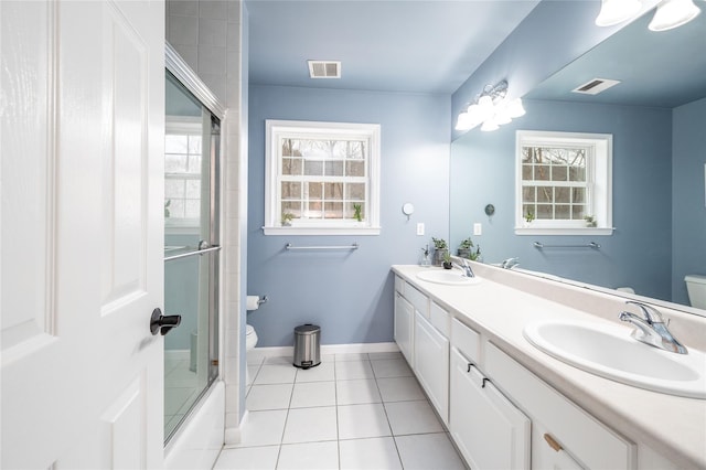 full bath featuring visible vents, baseboards, toilet, tile patterned floors, and a sink