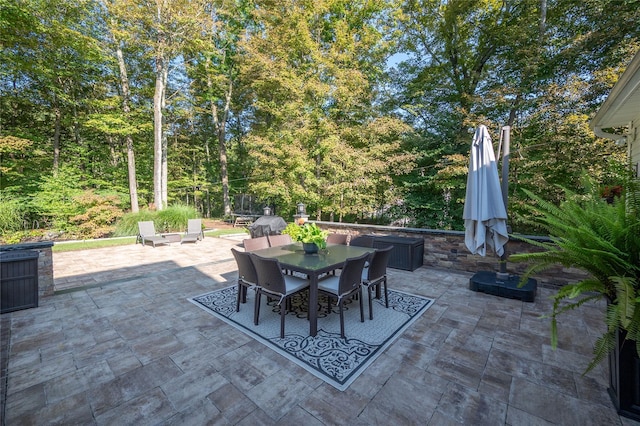 view of patio featuring outdoor dining space