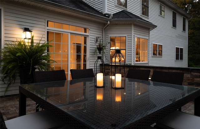 wooden terrace featuring outdoor dining area