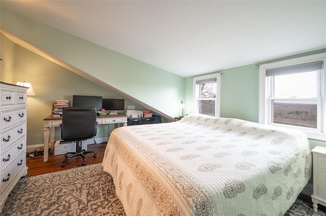 bedroom with wood finished floors