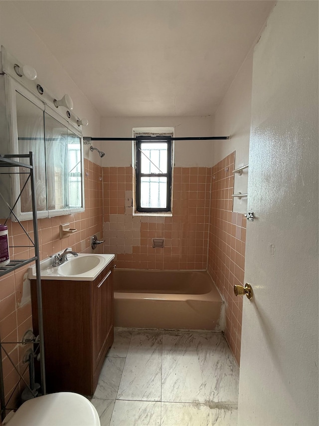 143 Bruce Ave Unit 7A, Yonkers, NY 10705 - bathroom with shower / washtub combination, vanity, marble look tiles, toilet, and tile walls