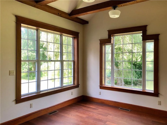 65 Boris Rd, Bloomingburg, NY 12721 - unfurnished room with vaulted ceiling with beams, wood finished floors, visible vents, and plenty of natural light