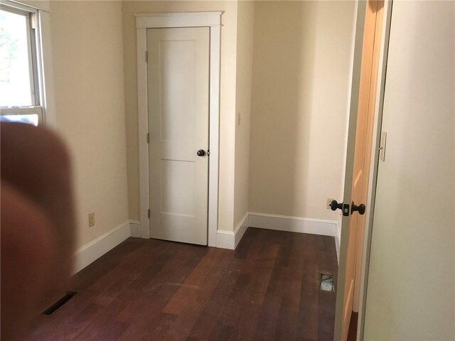 65 Boris Rd, Bloomingburg, NY 12721 - corridor featuring visible vents, baseboards, and dark wood-style flooring