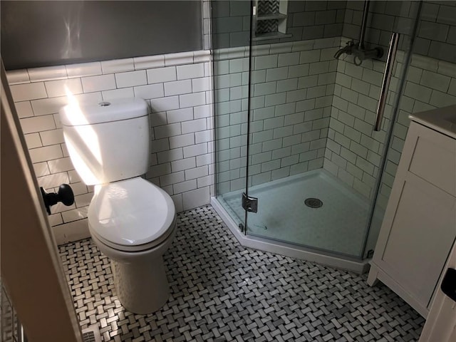 65 Boris Rd, Bloomingburg, NY 12721 - bathroom with toilet, a stall shower, and tile walls