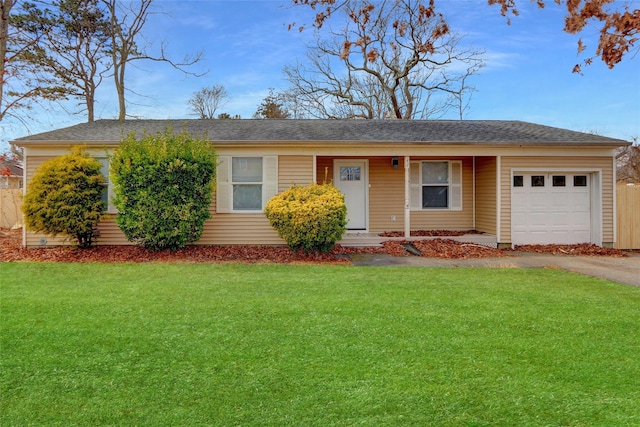 single story home featuring a front yard, an attached garage, driveway, and a shingled roof