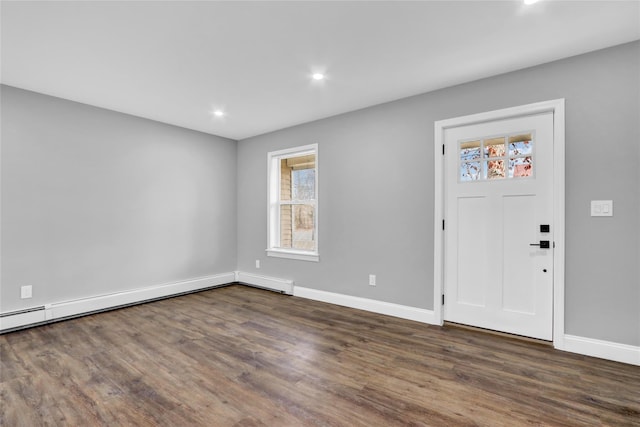 foyer featuring recessed lighting, baseboards, and dark wood-style floors