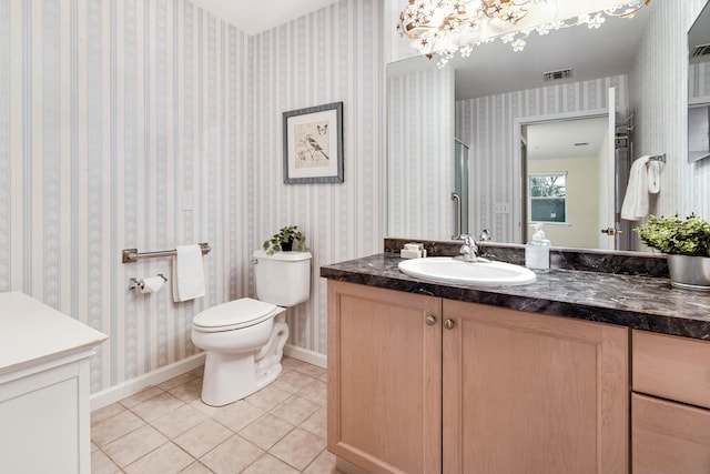 full bath featuring baseboards, toilet, tile patterned flooring, and wallpapered walls