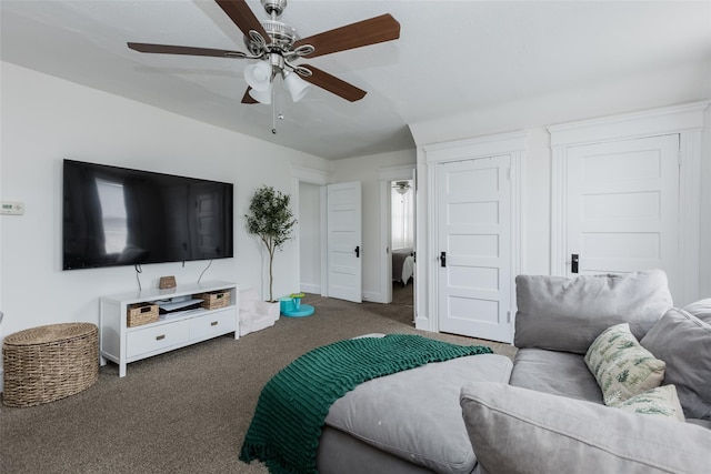 bedroom with baseboards, ceiling fan, and carpet floors