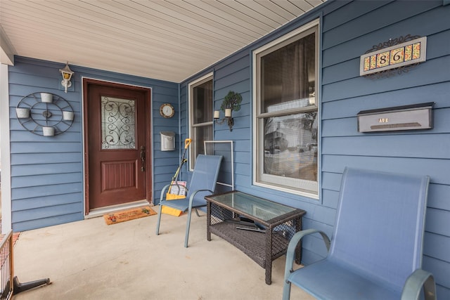 doorway to property featuring a porch