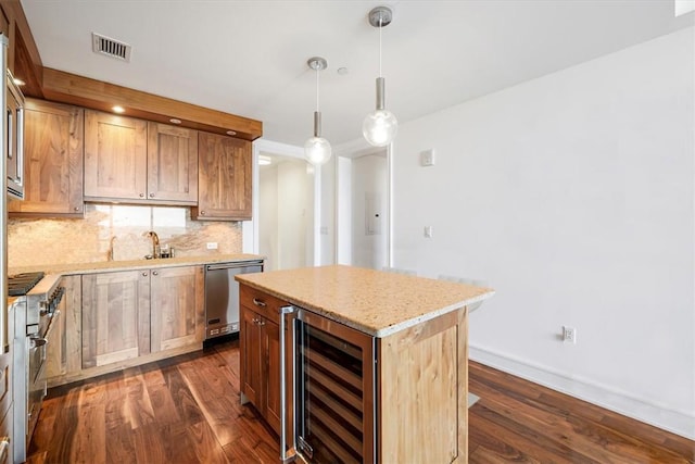 kitchen featuring visible vents, dark wood-type flooring, wine cooler, decorative backsplash, and dishwasher