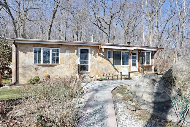 view of front of house featuring stone siding