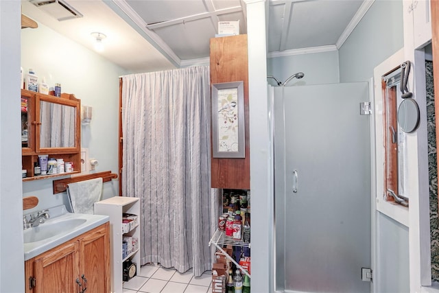 full bathroom with visible vents, ornamental molding, a shower stall, tile patterned flooring, and vanity