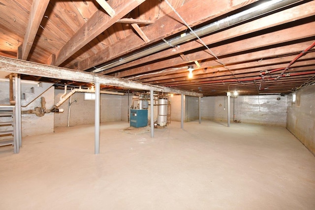 unfinished basement featuring stairs