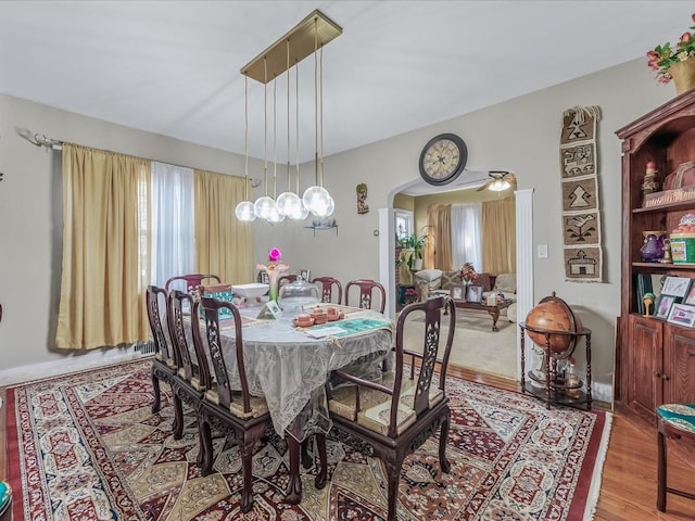 142-02 185th St, Springfield Gardens, NY 11413 - dining room with arched walkways and wood finished floors