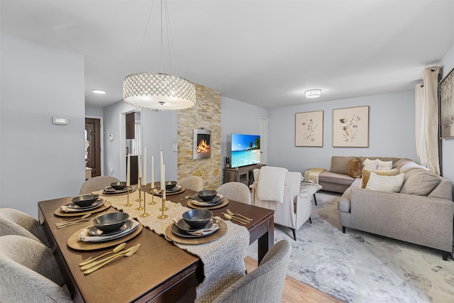 dining area featuring light wood-style flooring