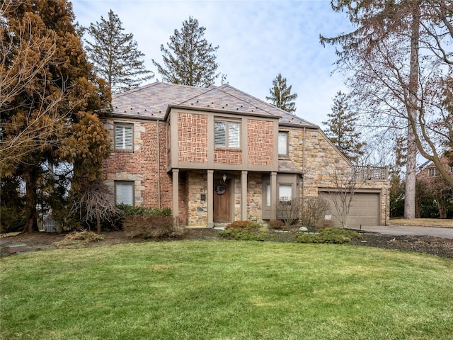 view of front of property with brick siding, a front lawn, a high end roof, a garage, and driveway