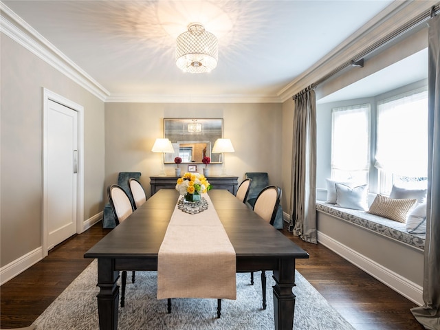 dining area with baseboards, dark wood finished floors, and crown molding