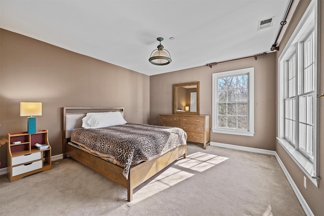 2 Camden Ct, Irvington, NY 10533 - bedroom with baseboards and light carpet