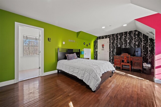2 Camden Ct, Irvington, NY 10533 - bedroom featuring an accent wall, wood-type flooring, vaulted ceiling, and recessed lighting