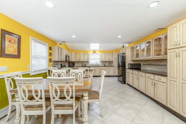 dining space featuring recessed lighting and visible vents