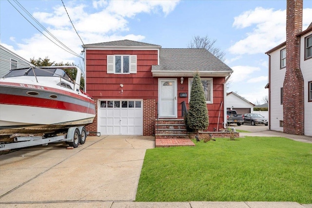 tri-level home featuring a front lawn, driveway, roof with shingles, an attached garage, and brick siding