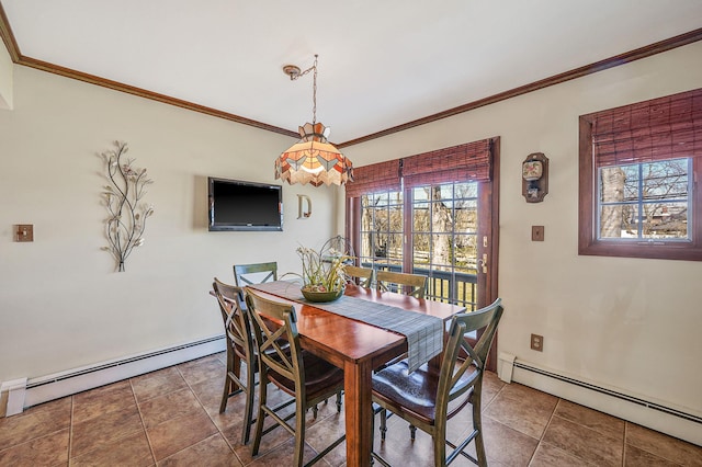 dining room with a baseboard heating unit and ornamental molding