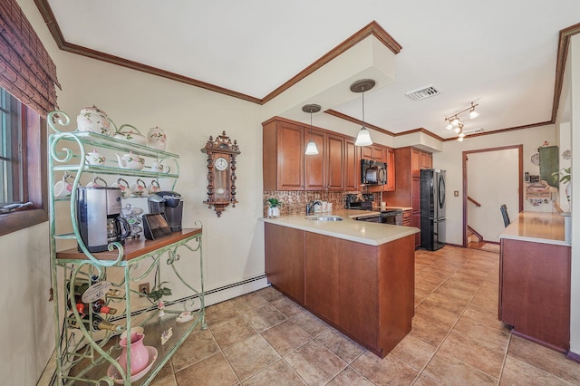 kitchen with visible vents, a sink, black appliances, light countertops, and brown cabinets