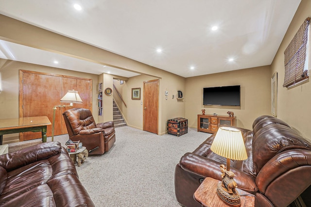 carpeted living area featuring stairway, recessed lighting, and baseboards