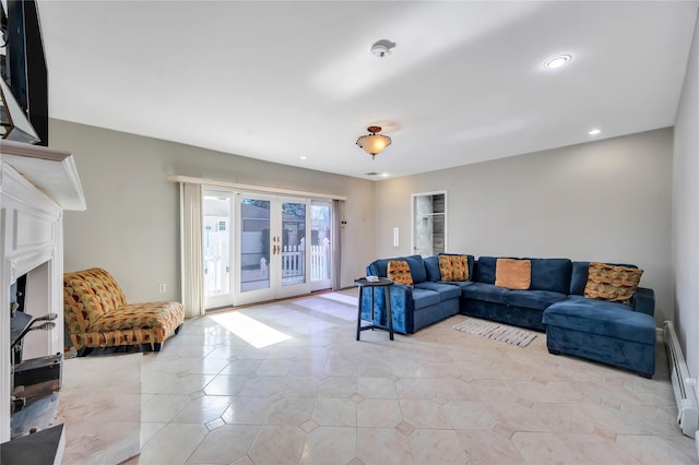 living area featuring light tile patterned floors, baseboard heating, recessed lighting, and french doors