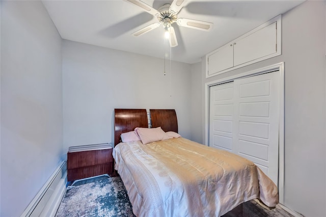 bedroom featuring ceiling fan, a closet, and a baseboard radiator