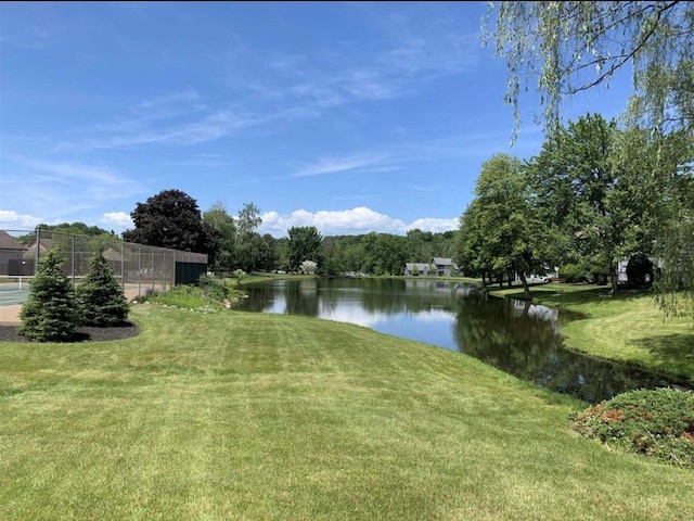 property view of water with fence