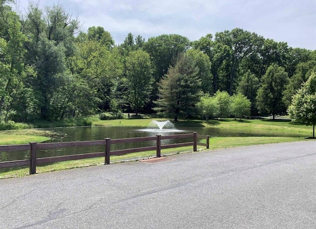 view of road featuring a water view