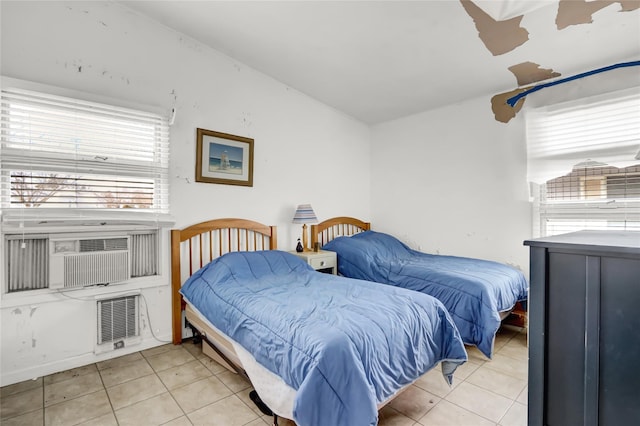 tiled bedroom featuring visible vents, cooling unit, and ceiling fan