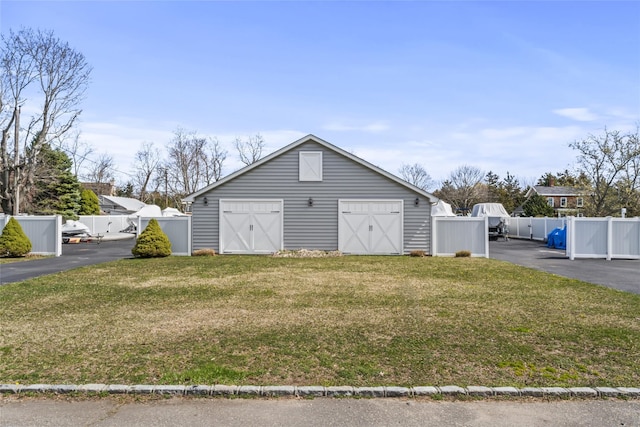 detached garage with fence