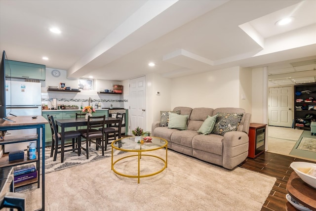 living room featuring wood finish floors and recessed lighting