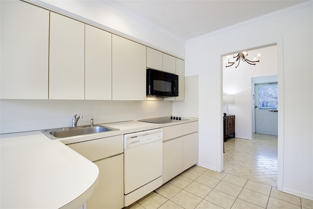 kitchen featuring black appliances, ornamental molding, a sink, light tile patterned flooring, and light countertops