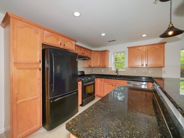 25 Fairways Dr Unit 1, Middletown, NY 10940 - kitchen with black appliances, under cabinet range hood, decorative backsplash, dark stone countertops, and recessed lighting
