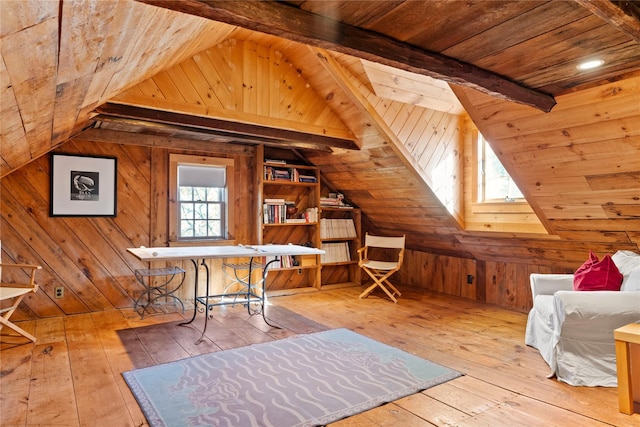 bonus room featuring wood walls, wooden ceiling, vaulted ceiling with beams, and hardwood / wood-style floors