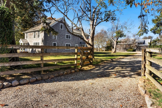 view of home's exterior featuring fence