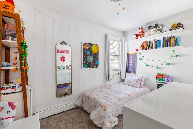 carpeted bedroom with a baseboard heating unit