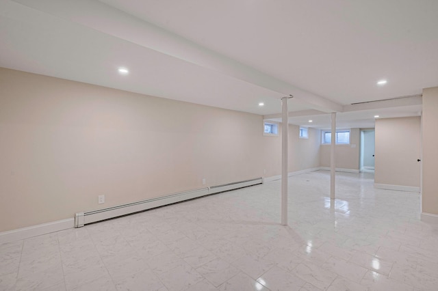 basement featuring recessed lighting, a baseboard heating unit, baseboards, and marble finish floor