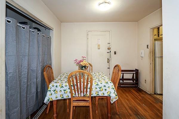 dining space featuring wood finished floors