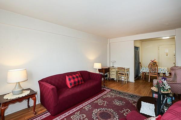 living area with wood finished floors