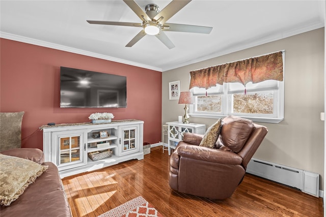 724 Thrush Ave, West Hempstead, NY 11552 - living area with a baseboard heating unit, ornamental molding, wood finished floors, ceiling fan, and baseboards