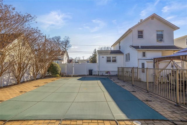 724 Thrush Ave, West Hempstead, NY 11552 - rear view of house featuring a gazebo, a fenced backyard, and a patio area