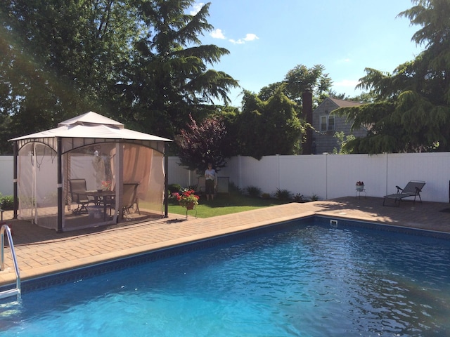 724 Thrush Ave, West Hempstead, NY 11552 - view of pool featuring a gazebo, fence, and a patio